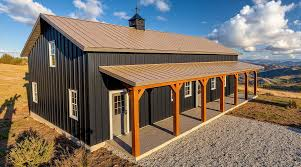 Black metal barndominium with wrap-around porch on a poured concrete slab