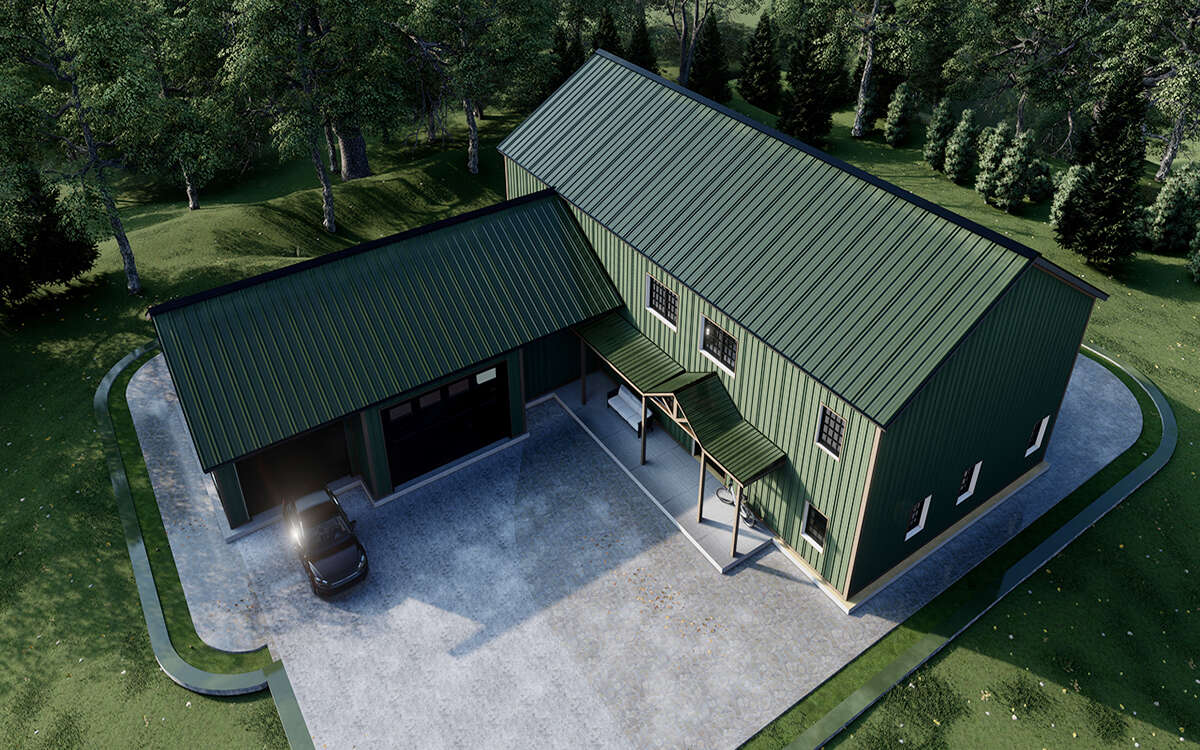 Aerial view of a completed barndominium foundation with concrete drive and walkways
